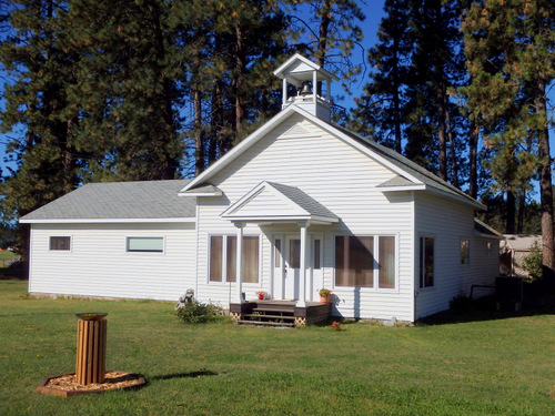 It appears to be a school that was converted to a home.